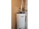 Image features a Whirlpool water heater with an expansion tank in good condition at 956 S Deshon Rd, Lithonia, GA 30058