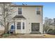 Back view of a house with large windows and a patio at 2510 Thorngate Dr, Acworth, GA 30101