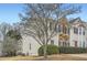 Inviting townhome showcases a stone accent wall and red shutters at 2510 Thorngate Dr, Acworth, GA 30101