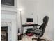 A dedicated home office is setup near the fireplace at 2510 Thorngate Dr, Acworth, GA 30101