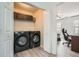 Convenient laundry room with washer and dryer hookups located near a bedroom at 2510 Thorngate Dr, Acworth, GA 30101