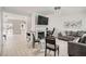 Bright living room with fireplace, mounted TV, and modern decor at 2510 Thorngate Dr, Acworth, GA 30101