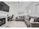 Comfortable living room space with modern furniture and marble fireplace at 2510 Thorngate Dr, Acworth, GA 30101