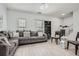 Spacious living room with plush gray sofa and stylish decor at 2510 Thorngate Dr, Acworth, GA 30101