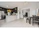Open living space with a kitchen island, dining area, and modern finishes at 2510 Thorngate Dr, Acworth, GA 30101