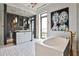 Modern bathroom with a freestanding tub, walk-in shower, and stylish fixtures at 3376 Peachtree Ne Rd # 56, Atlanta, GA 30326