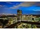 Stunning city view at night showcasing a high-rise building and the surrounding cityscape with illuminated buildings at 3376 Peachtree Ne Rd # 56, Atlanta, GA 30326
