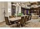 Stunning dining room with modern chandelier, long table with seating for ten, and sleek decor at 3376 Peachtree Ne Rd # 56, Atlanta, GA 30326