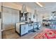 Contemporary kitchen with a large island, modern appliances, and stylish pendant lighting at 3376 Peachtree Ne Rd # 56, Atlanta, GA 30326