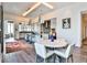 Open concept kitchen and dining area featuring a round table and modern decor at 3376 Peachtree Ne Rd # 56, Atlanta, GA 30326