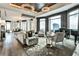 Bright, open living space featuring city views, elegant lighting, and a seamless flow between living and dining areas at 3376 Peachtree Ne Rd # 56, Atlanta, GA 30326