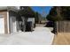 Long driveway with parking area, with a view of the backyard and side entrance at 4845 Dartford Dr, Powder Springs, GA 30127
