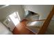 Open foyer with hardwood flooring and a view of the staircase and front entrance at 4845 Dartford Dr, Powder Springs, GA 30127