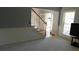 Inviting foyer with hardwood flooring and a staircase leading to the upper level at 4845 Dartford Dr, Powder Springs, GA 30127