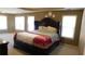 Spacious primary bedroom with multiple windows, providing ample natural light at 4845 Dartford Dr, Powder Springs, GA 30127
