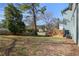Backyard view showing the deck and side of the house at 561 Ashburton Ave, Decatur, GA 30032