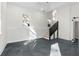 Bonus room featuring a finished floor and staircase at 561 Ashburton Ave, Decatur, GA 30032