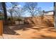 Large wooden deck with horizontal wood railing with views of the back yard at 561 Ashburton Ave, Decatur, GA 30032