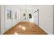 Open concept dining room with natural light, modern chandelier, and stylish barn door at 561 Ashburton Ave, Decatur, GA 30032