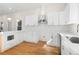 Beautifully updated kitchen features quartz countertops, stainless appliances, and shaker style cabinets at 561 Ashburton Ave, Decatur, GA 30032