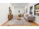 Cozy living room featuring hardwood floors, neutral decor, and ample natural light for a welcoming atmosphere at 561 Ashburton Ave, Decatur, GA 30032