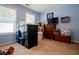 Blue bedroom with carpet and plenty of storage boxes at 613 Hemlock Ct, Villa Rica, GA 30180