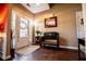 Warm foyer with hardwood floors, bench seating, and natural light streaming through the front door at 613 Hemlock Ct, Villa Rica, GA 30180