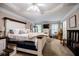This main bedroom has a tray ceiling and neutral-toned walls at 613 Hemlock Ct, Villa Rica, GA 30180