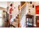 Carpeted staircase with white railing and wooden posts at 613 Hemlock Ct, Villa Rica, GA 30180