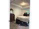 Bedroom with bed and furniture including a dresser at 5531 Four Winds Sw Dr, Lilburn, GA 30047