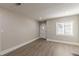 Cozy living area with updated flooring, fresh paint, and natural light streaming through the windows at 1376 Westmont Sw Rd, Atlanta, GA 30311