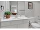 Clean and modern bathroom with white vanity, toilet, and updated fixtures at 2599 Oglethorpe Ne Cir, Brookhaven, GA 30319