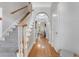 Foyer featuring hardwood floors, a staircase, and views to the open living space at 2599 Oglethorpe Ne Cir, Brookhaven, GA 30319