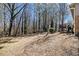 Exterior of home with expansive backyard and mature trees at 3080 Forrest Park Road Se, Atlanta, GA 30354