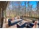 Cozy outdoor deck seating area with comfortable sofa and chairs at 3080 Forrest Park Road Se, Atlanta, GA 30354