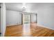 Bright living room featuring hardwood floors and a sliding door to the outside at 3080 Forrest Park Road Se, Atlanta, GA 30354
