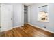 This bedroom offers ample storage, hardwood floors, closet, and bright natural light at 3080 Forrest Park Se Rd, Atlanta, GA 30354