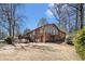 A charming brick home with a large yard and deck; ideal for outdoor living at 3080 Forrest Park Se Rd, Atlanta, GA 30354