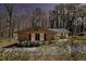 Charming brick home features classic shutters, mature landscaping, and a welcoming driveway at 3080 Forrest Park Se Rd, Atlanta, GA 30354