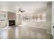 Expansive living area featuring a fireplace, large windows, and neutral tile flooring at 3080 Forrest Park Se Rd, Atlanta, GA 30354
