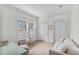 Bright bedroom with neutral decor, large window, and closet at 80 26Th Nw St, Atlanta, GA 30309