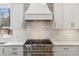 Close-up of a gourmet kitchen featuring high-end appliances, custom cabinetry, and sleek countertops at 80 26Th Nw St, Atlanta, GA 30309