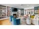 Stylish living room with built-in bookshelves, a fireplace, and comfortable seating arrangement at 80 26Th Nw St, Atlanta, GA 30309