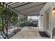 Charming patio with black-and-white awning and outdoor dining area at 80 26Th Nw St, Atlanta, GA 30309
