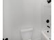 Bathroom featuring a toilet and a shower with a black shower head and handle at 1356 Auburn Glen Rd, Dacula, GA 30019