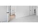 Neutral hallway with white doors and baseboards providing a clean transition between rooms at 1356 Auburn Glen Rd, Dacula, GA 30019
