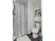 Bathroom featuring a shower/tub combo and storage at 4558 Ryan Rd, Conley, GA 30288