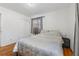 Bedroom with hardwood flooring, closet, and neutral color scheme at 4558 Ryan Rd, Conley, GA 30288