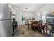 Bright kitchen with stainless steel appliances and a cozy dining area at 4558 Ryan Rd, Conley, GA 30288