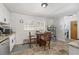 Open kitchen with tile floors, stainless appliances, and a table with seating at 4558 Ryan Rd, Conley, GA 30288